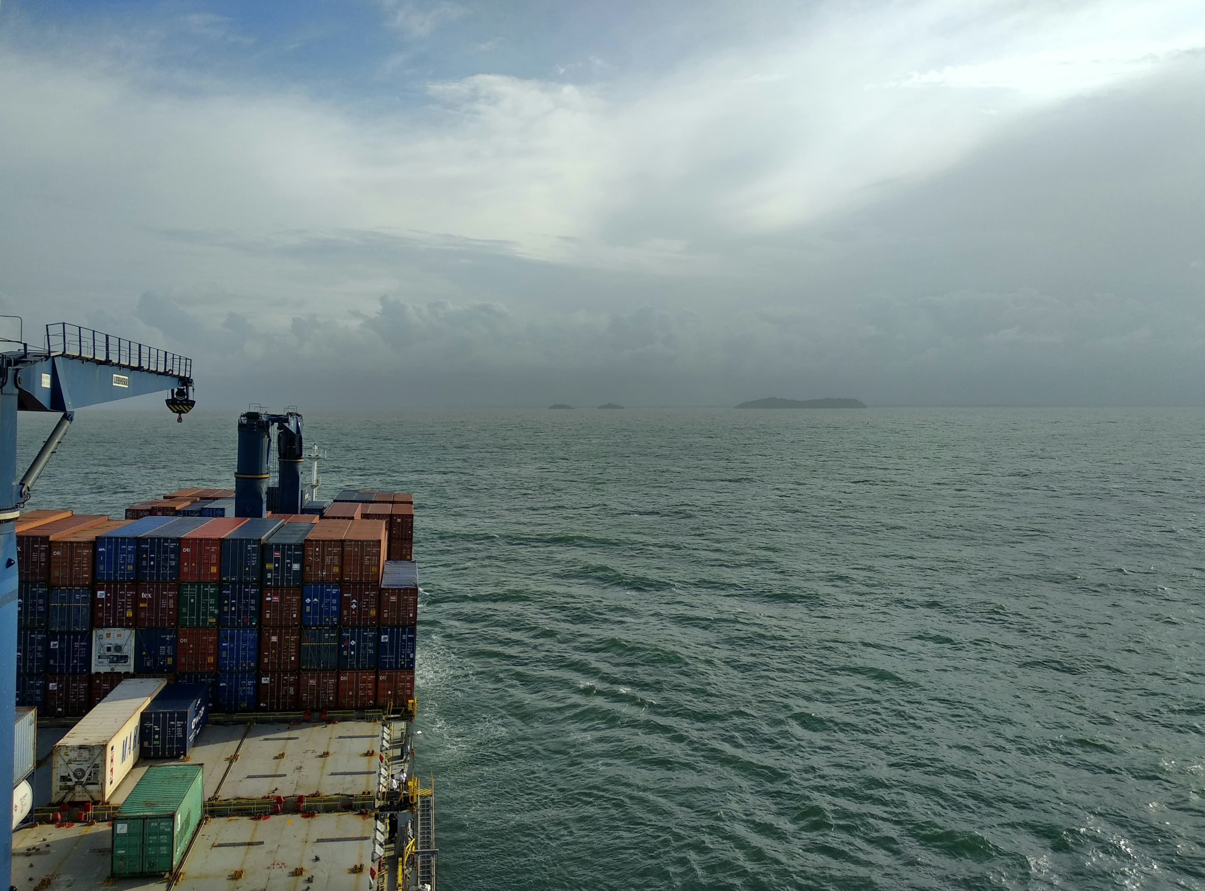 Container ship at sea loaded with containers